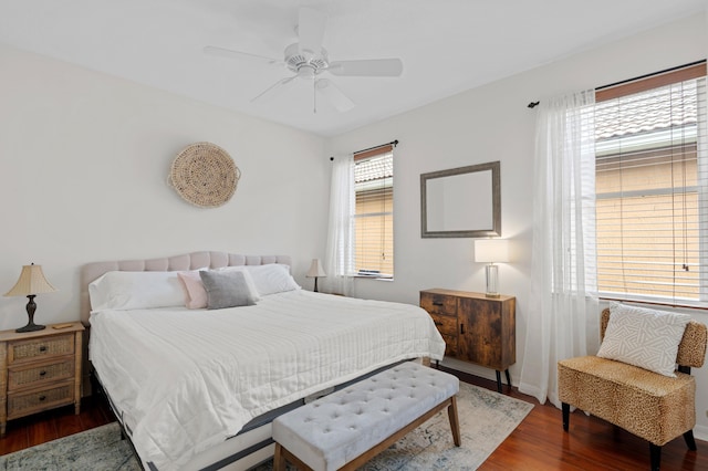 bedroom featuring dark wood-type flooring and ceiling fan