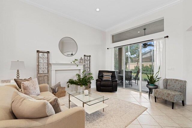 living room featuring ceiling fan and light tile patterned floors