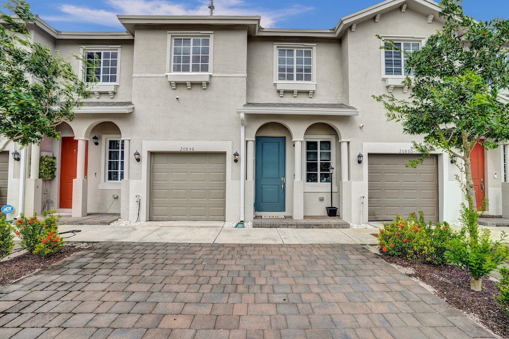 view of front of property with a garage