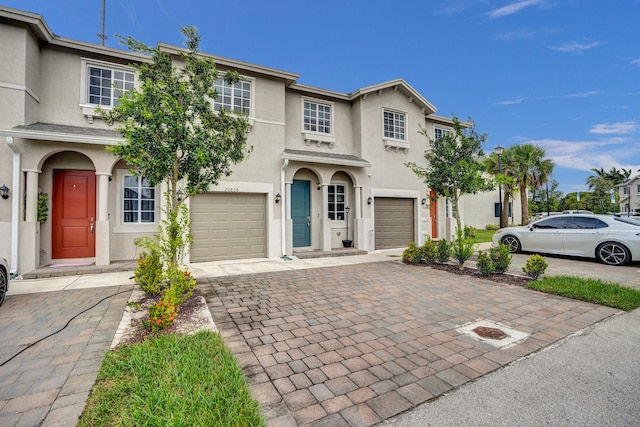 view of front of property with a garage