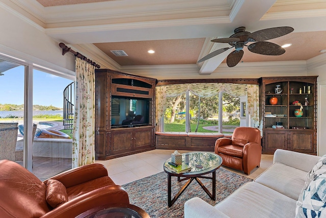 tiled living room with ceiling fan, a wealth of natural light, and ornamental molding