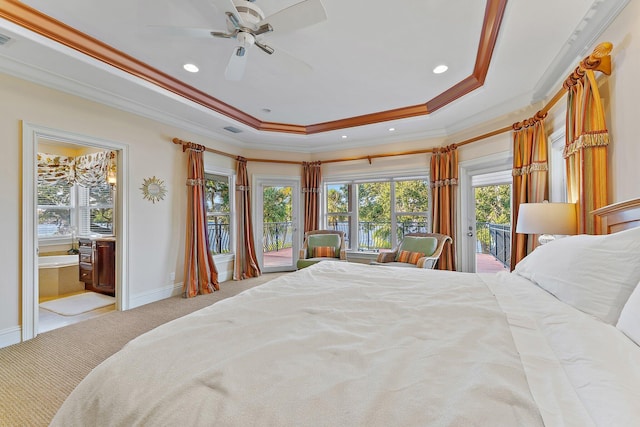 carpeted bedroom with ceiling fan, ornamental molding, a tray ceiling, and access to outside