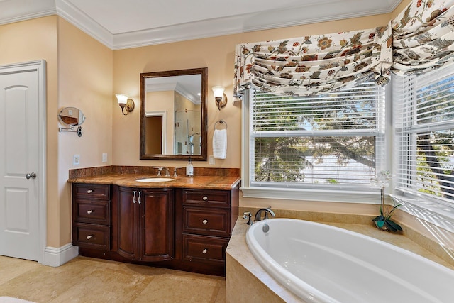 bathroom featuring a relaxing tiled tub, vanity, and ornamental molding