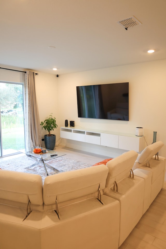 living room with light hardwood / wood-style flooring