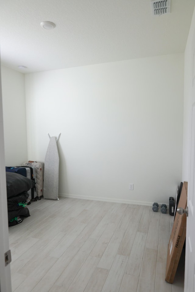 bedroom featuring light hardwood / wood-style floors