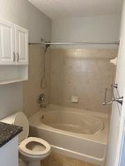 136 SW Peacock Blvd Unit 19-204, Port Saint Lucie, FL 34986 - bathroom with toilet, shower / bathtub combination, and vanity