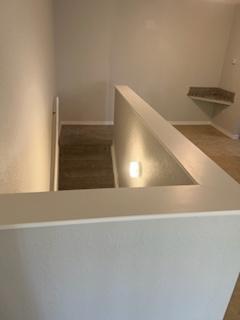 136 SW Peacock Blvd Unit 19-204, Port Saint Lucie, FL 34986 - stairs featuring baseboards