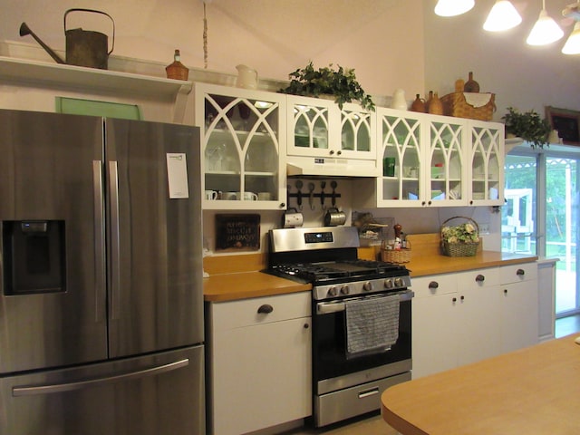 kitchen featuring white cabinetry and stainless steel appliances