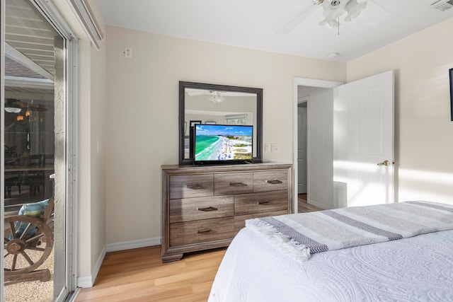 bedroom featuring hardwood / wood-style floors and ceiling fan