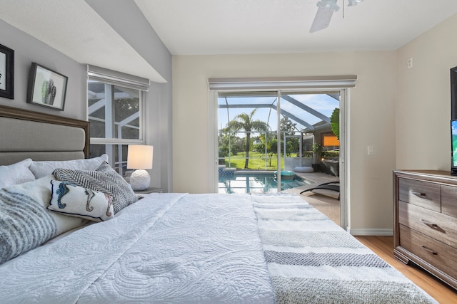 bedroom featuring ceiling fan, access to outside, and wood-type flooring