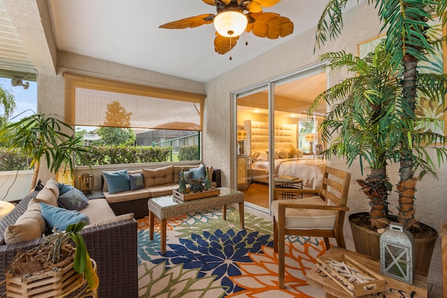 sunroom / solarium with ceiling fan