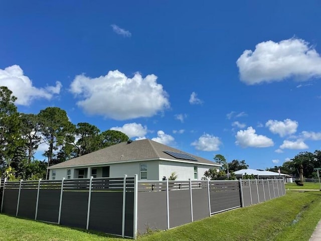 view of property exterior featuring a yard