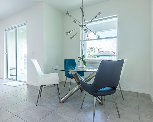 dining space featuring an inviting chandelier