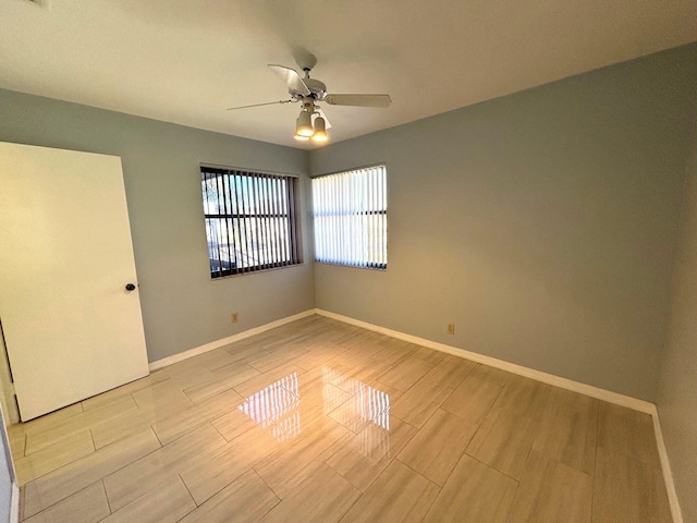 empty room featuring ceiling fan