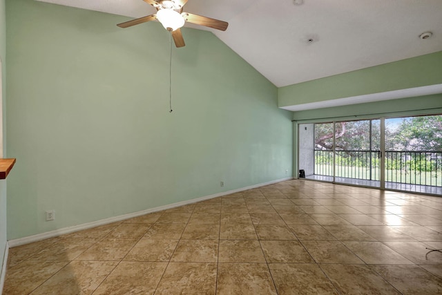 tiled empty room featuring high vaulted ceiling and ceiling fan