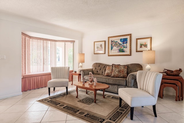 tiled living room with a textured ceiling