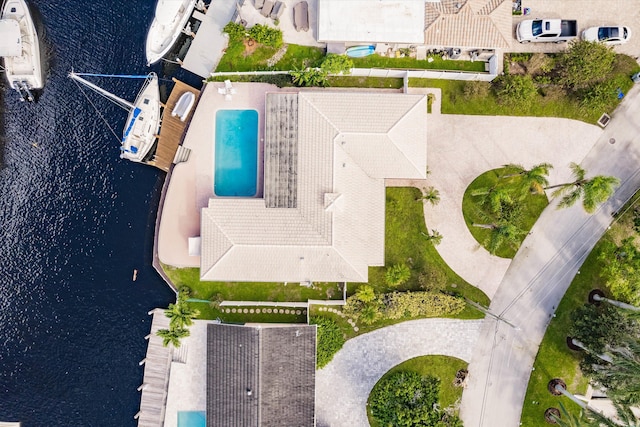 drone / aerial view with a water view