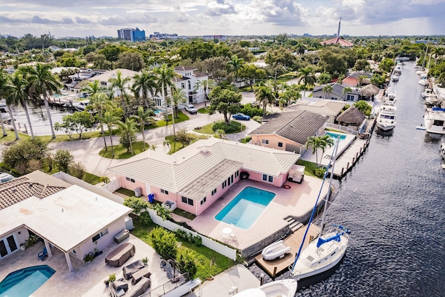 drone / aerial view with a water view