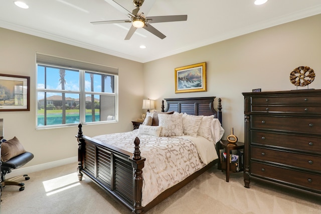 carpeted bedroom with crown molding, a water view, and ceiling fan