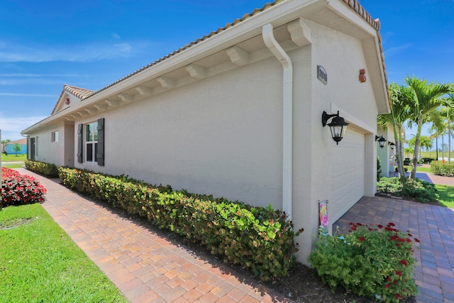 view of home's exterior with a garage