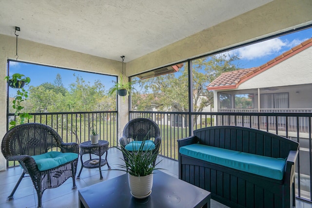 sunroom featuring a healthy amount of sunlight