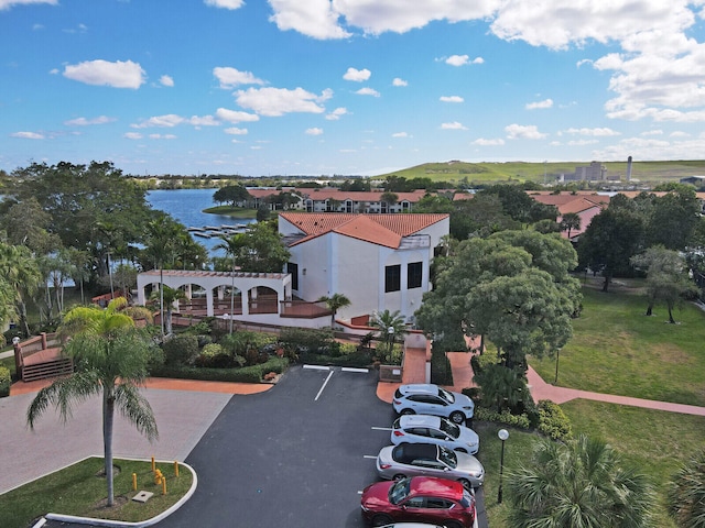 drone / aerial view featuring a water view