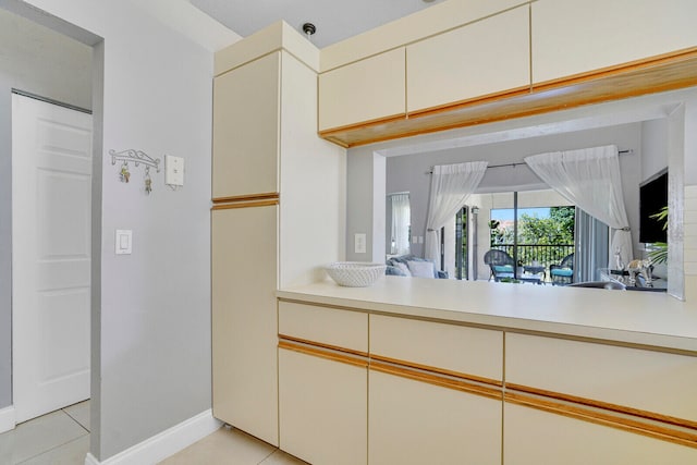 kitchen with light tile patterned floors