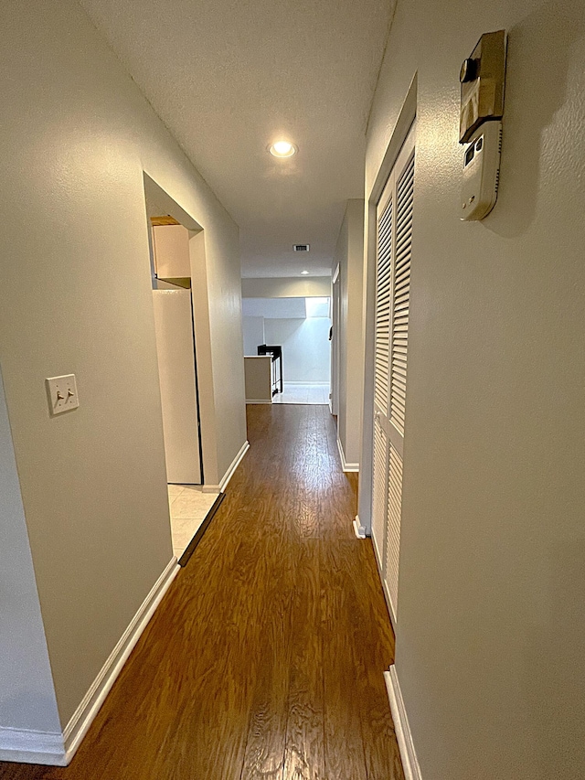 hall featuring hardwood / wood-style floors