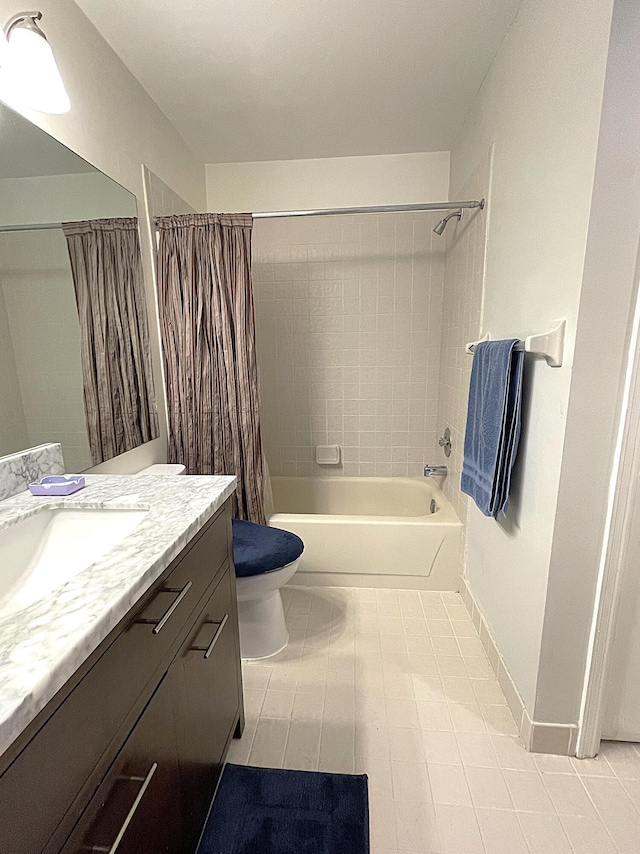 full bathroom featuring toilet, shower / bath combo, and vanity