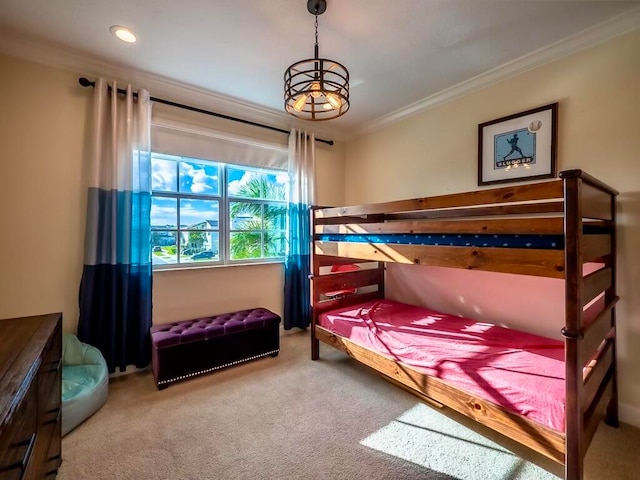 carpeted bedroom with crown molding