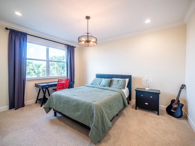 carpeted bedroom with crown molding and a notable chandelier