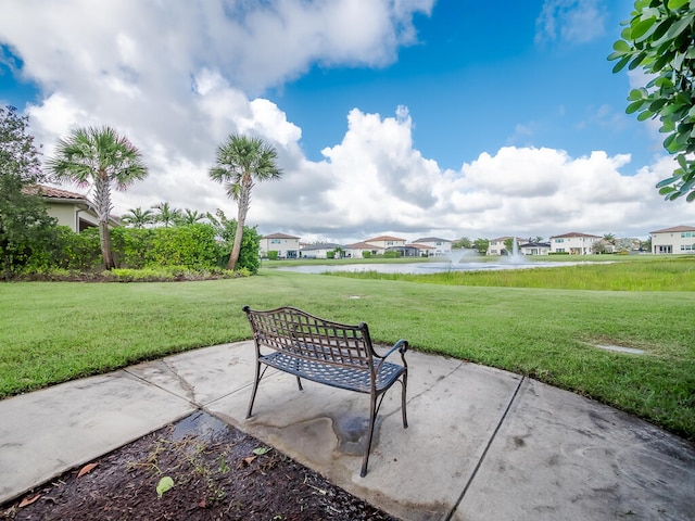 view of patio / terrace with a water view