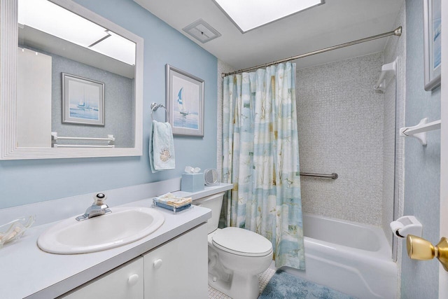 full bathroom with vanity, shower / bath combo with shower curtain, toilet, and tile patterned flooring