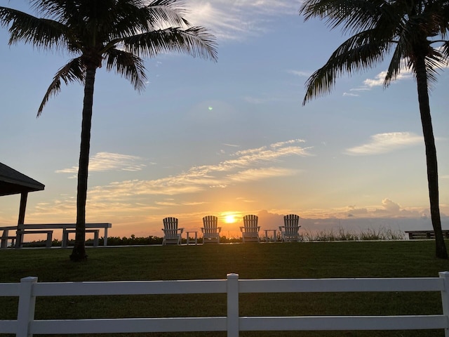 view of yard at dusk