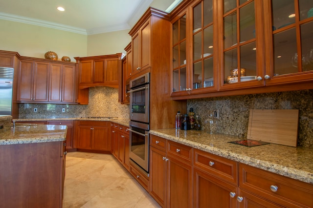 kitchen featuring ornamental molding, light stone counters, stainless steel appliances, and tasteful backsplash