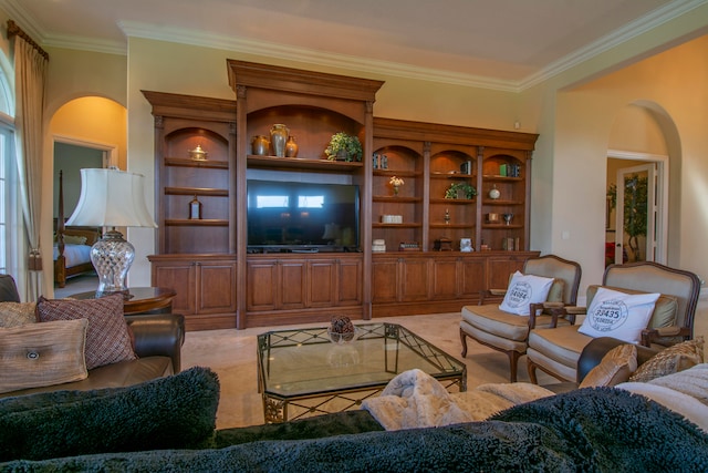 living room featuring ornamental molding, light colored carpet, and plenty of natural light