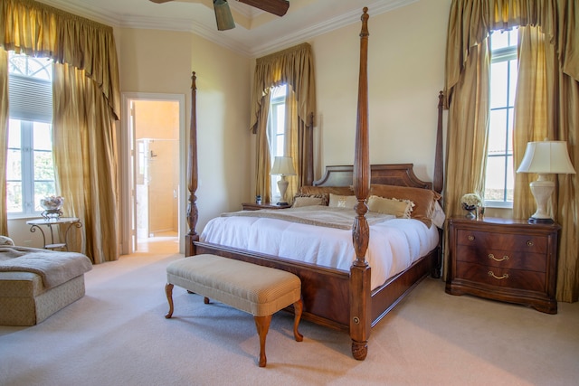 carpeted bedroom featuring connected bathroom, crown molding, and ceiling fan