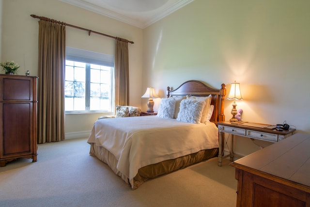 carpeted bedroom featuring crown molding