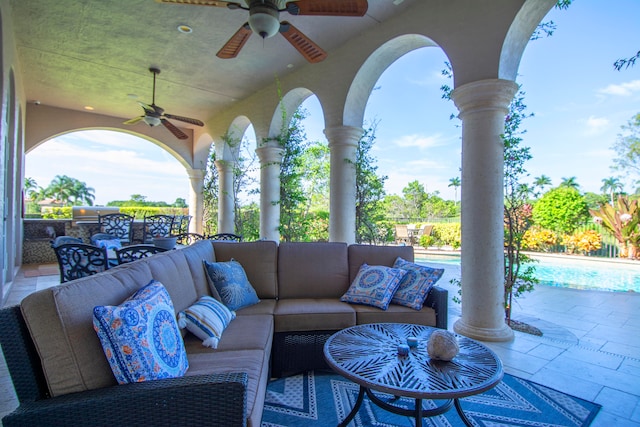 view of patio / terrace featuring a fenced in pool, an outdoor hangout area, and ceiling fan