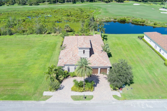 birds eye view of property featuring a water view