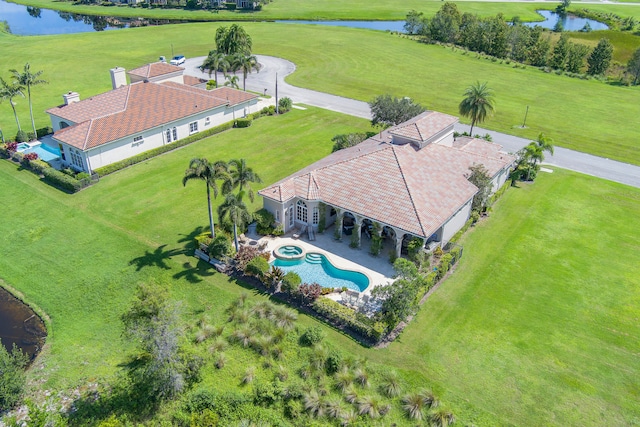 bird's eye view with a water view