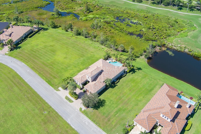 drone / aerial view with a water view