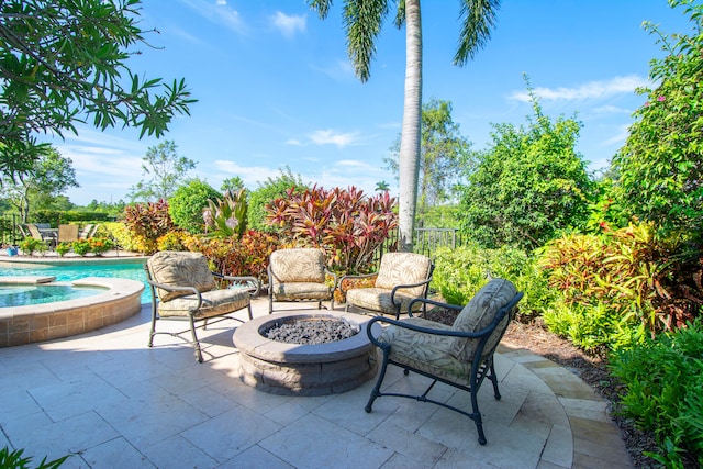 view of patio featuring a fire pit