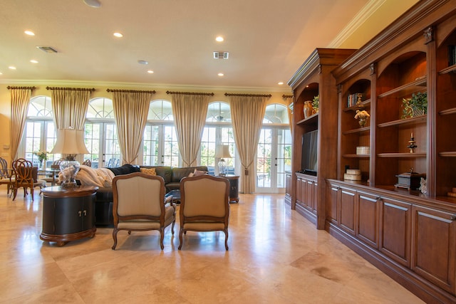 interior space featuring french doors, plenty of natural light, and crown molding