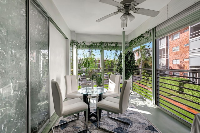 sunroom / solarium with ceiling fan