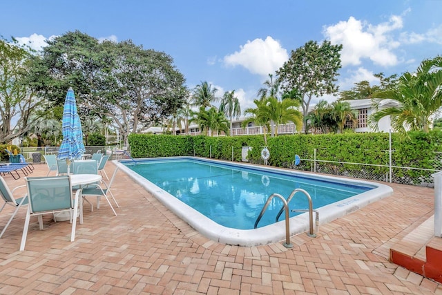 view of pool with a patio area