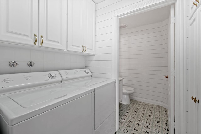 clothes washing area with laundry area and separate washer and dryer