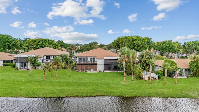 exterior space with a water view