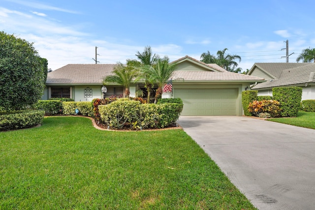 ranch-style house featuring a garage and a front lawn