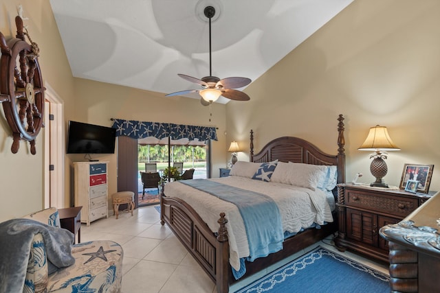 tiled bedroom with ceiling fan and access to outside